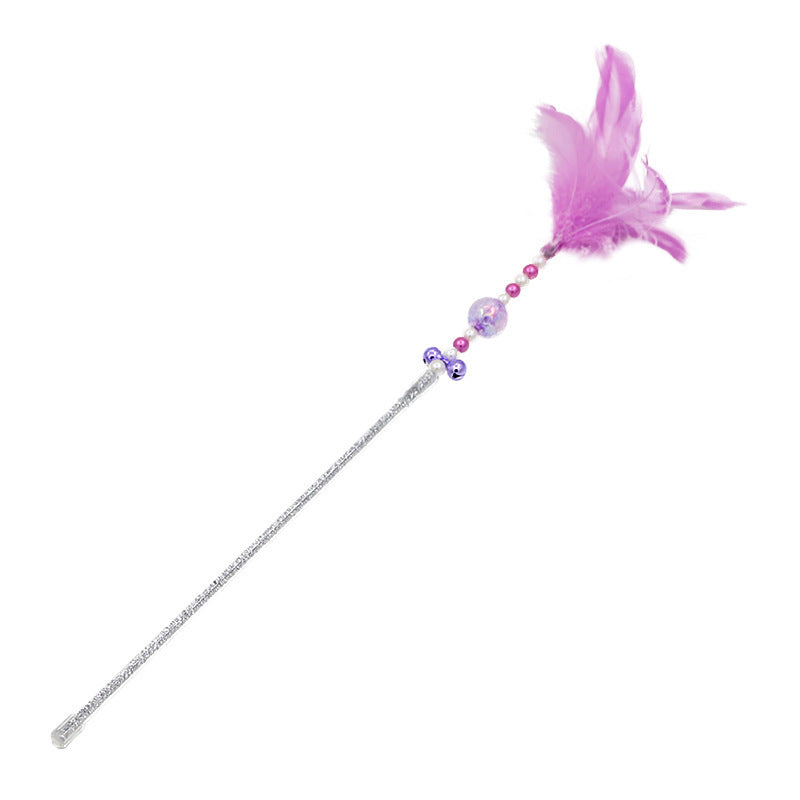 Colored feather bells, funny cats, fairy sticks