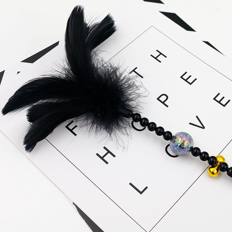 Colored feather bells, funny cats, fairy sticks